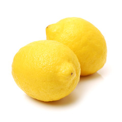 Ripe lemons on white background