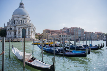 Obraz na płótnie Canvas gondolas in venice near the pier