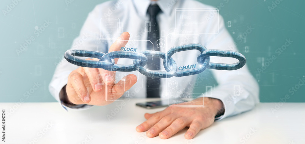 Poster businessman holding a virtual blockcahin with data - 3d rendering