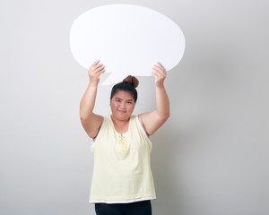 Portrait Of Smiling Woman With Speech Bubble Standing