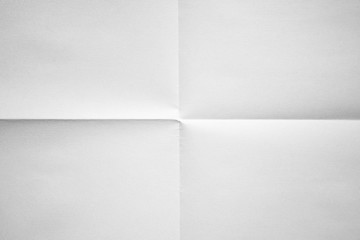 White paper folded in four fraction background - obrazy, fototapety, plakaty
