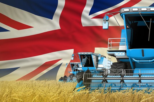 3 blue modern combine harvesters with United Kingdom (UK) flag on farm field - close view, farming concept - industrial 3D illustration