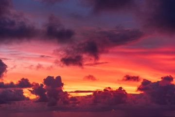 Aerial view of colorful coastal clouds after sunset