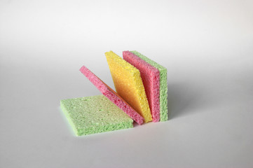 Bright colored sponges for washing dishes, cleaning the bathroom and other household needs.