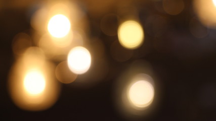 dark bokeh background with yellow round lights