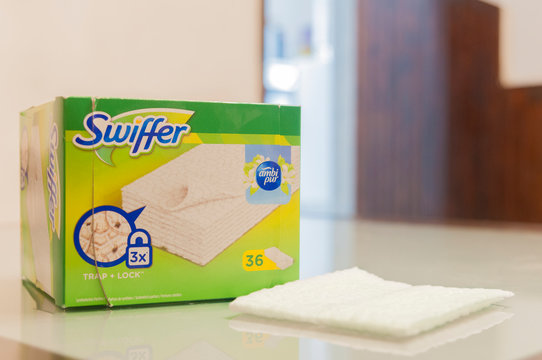 A 36-pack of  Swiffer dust captures cloths with an ambi pur fragrance on a table