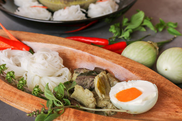 Thai Food Spicy Green Curry Chicken and Organic Vegetable, Chili and Herbs Come with Rice Noodles, Salted Egg. Homemade Asian Culinary.