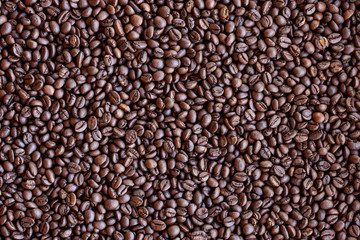 Roasted coffee beans background.