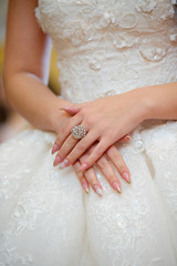 Elegant female hands of bride