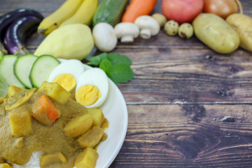Asian Food Curry Rice with Apple Chicken and Mushroom.