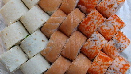 sushi in fish and dough top view