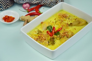 Opor ayam, chicken cooked in coconut milk and spices, originated from Central Java, Indonesia. Popular dish for lebaran or Eid al-Fitr
