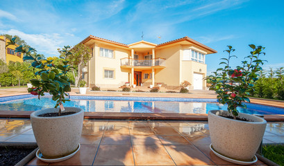 Classic new home with pool. Real estate Luxury exterior design pool villa
