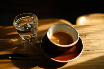 Stylish served specialty alternative black coffee. Filter pour-over coffee served in crystal glass and decanter. Aesthetics coffee
