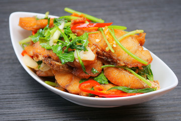 Stir fried sea bass with celery