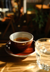 Stylish served specialty alternative black coffee. Filter pour-over coffee served in crystal glass and decanter. Aesthetics coffee