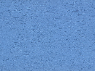 Blue background facade plaster . Monolithic plaster decorative backdrop. Single layer scraped cement plaster wallpaper. Exterior building structure backdrop. Silica sand cement wall plaster