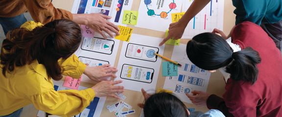 Brainstorm planing creative asian teamwork,  Group of asia mobile phone app developer team meeting...