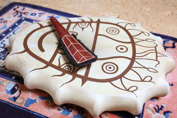 shaman drum and shaman attributes, in the city, inside the apartment