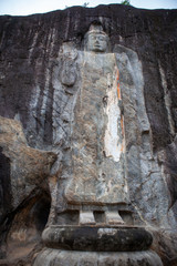 Buddha carved in a rock