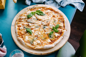 whole four cheese pizza