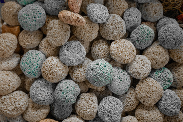 Pumice stone foot shaped scrub tool close up