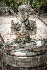 Fototapeta na wymiar Thailand Hua Hin Chinese Temple Praying Statue