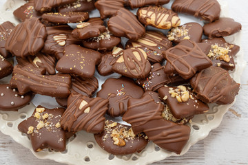 Gingerbread cake, Christmas gingerbread cake covered with chocolate and decorated with nuts and almonds