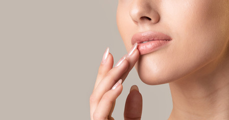 Unrecognizable Girl Touching Lips Over Beige Studio Background, Panorama, Cropped - obrazy, fototapety, plakaty