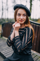 Naklejka premium Girl in the park