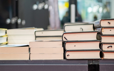 Book stack displayed in the book fair for business and education background