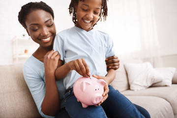African american family saving money for education