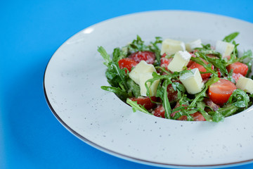 Greek salad with feta cheese, organic olives, juicy tomatoes, and lettuce. Concept for healthy nutrition.