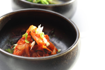 Kimchi, a spicy salad made of pickled Chinese cabbage. Traditional oriental cuisine.