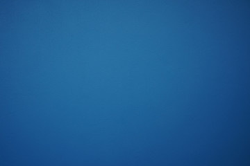 Bright blue cement wall for background and textures.  Decoration,  building and renovation ideas.