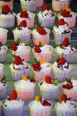 Beautiful and bright desserts on the festive table for the party.