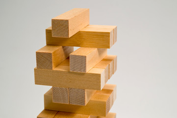 A puzzle game made of wooden blocks. Background for the development of imagination and spatial thinking.