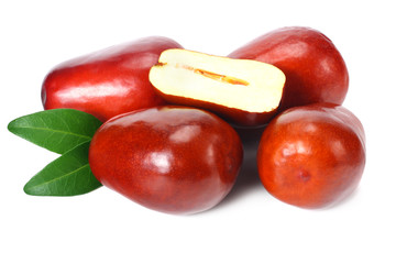 fresh date fruit with sleces and leaves isolated on white background.