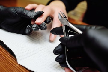 men's manicure close-up on the background of the table