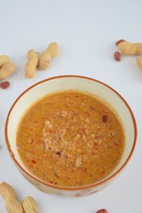 Peanut sauce or Bumbu Kacang, made from ground roasted or fried peanuts with chili, garlic, soy sauce, tamarind and spices