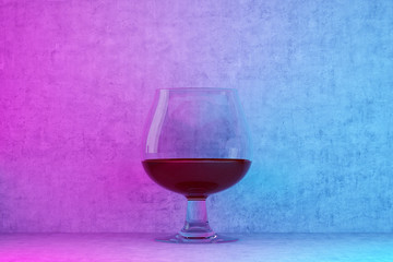 glass of wine in pink-blue lighting