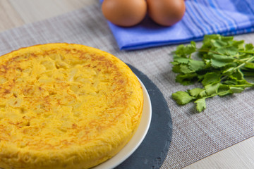 Spanish potato omelette dish with egg ready to eat