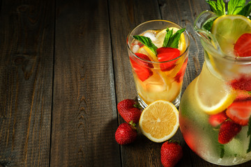 Lemonade with lemon and strawberry, mint and ice