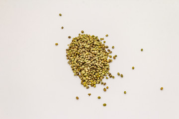Ripe hemp seeds isolated on white background