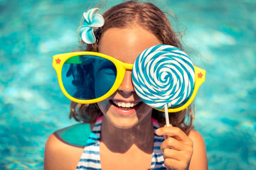 Happy child having fun on summer vacation