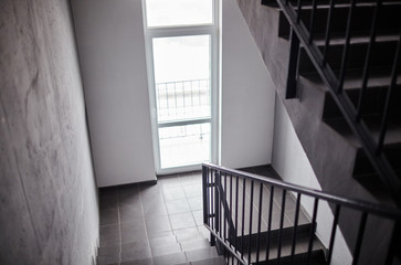 Staircase - emergency exit in hotel or office building, close-up staircase, interior staircases. Staircase in modern building