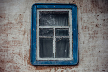 Vintage window with blue frame