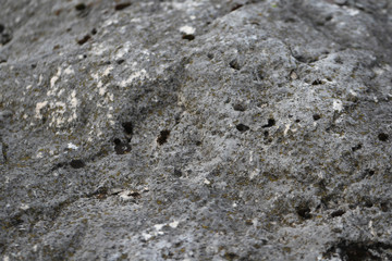 white stones, natural material to use as a background, natural stone texture, quarry, old house wall made of natural stone