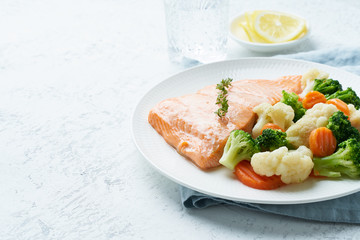 Steam salmon and vegetables, Paleo, keto, fodmap, dash diet. Mediterranean food with fish