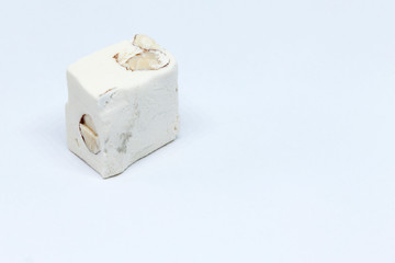 a good piece of nougat candy on white background